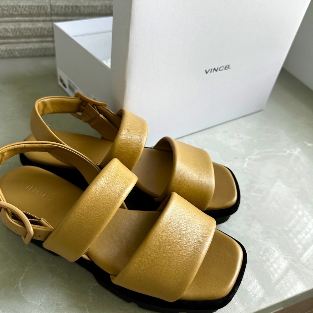 Beautiful cushy beige Vince sandals. Size 9 like new.